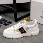 Versace white sneakers with gold crest strap, multicolor logo panel and thick sole