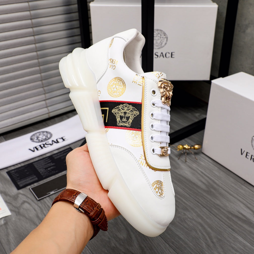 Versace white sneakers with gold heel emblem, logo stripe panel, and padded sole