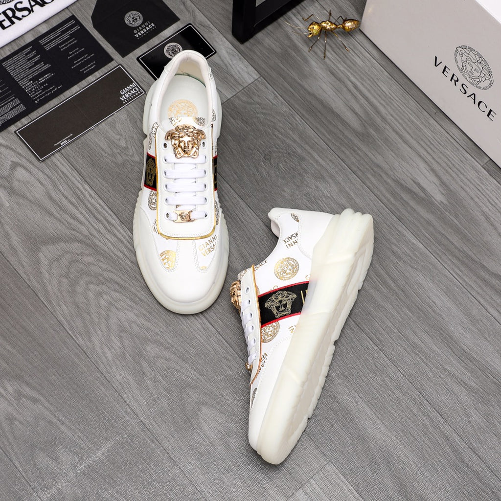 Versace white sneakers with gold crest detail and logo stripe on chunky sole