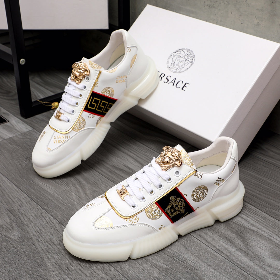 Versace white leather-style sneakers with gold crest hardware and logo stripe