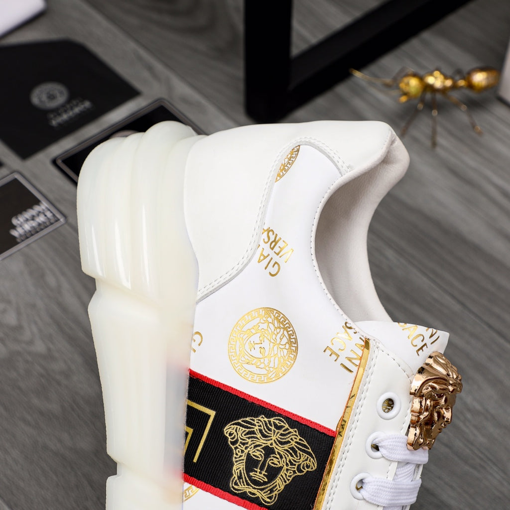 Versace white high-sole sneakers with gold crest lace hardware and logo accent