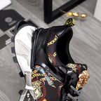 Black Versace sneakers with checkered laces, baroque side panel, gold emblem on tongue