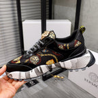 Black sneakers with baroque print upper, checkered laces, gold crest on tongue, cushioned sole
