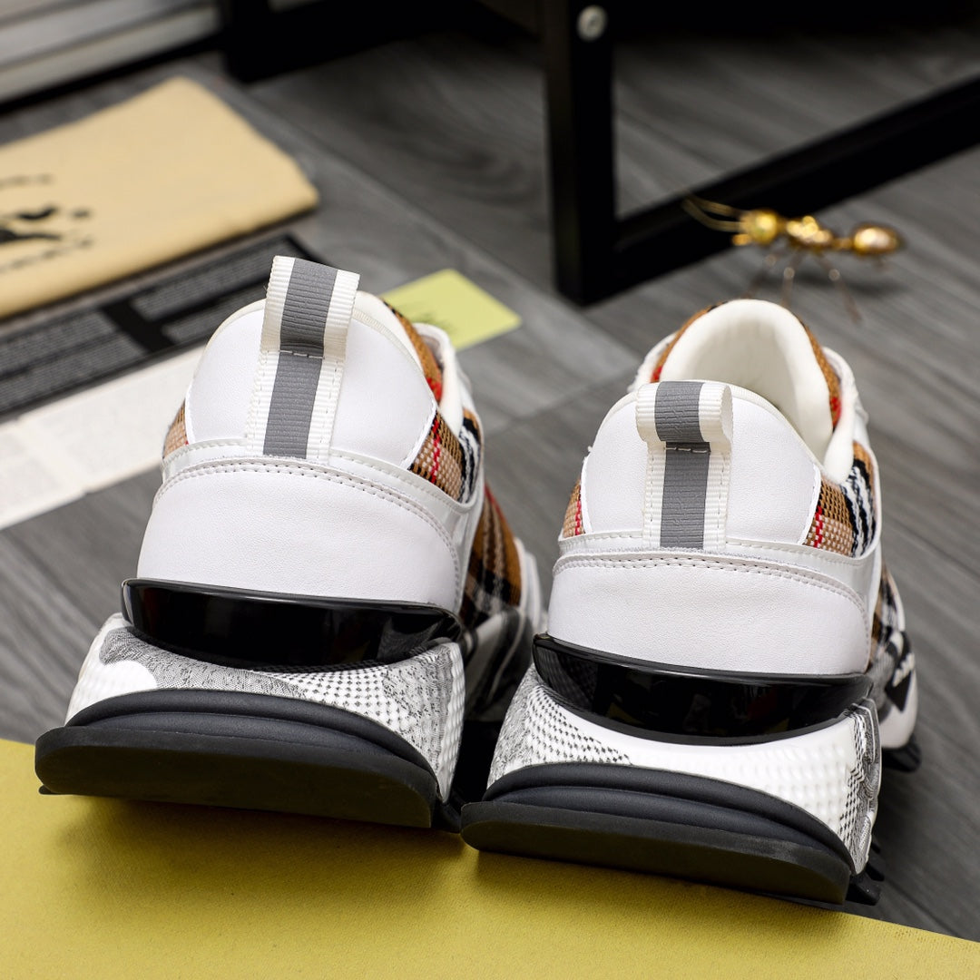 Burberry sneaker heel view: white leather with check inserts and dark rubber sole