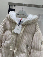 Cream long hooded puffer jacket with full front zipper and drawcord hood