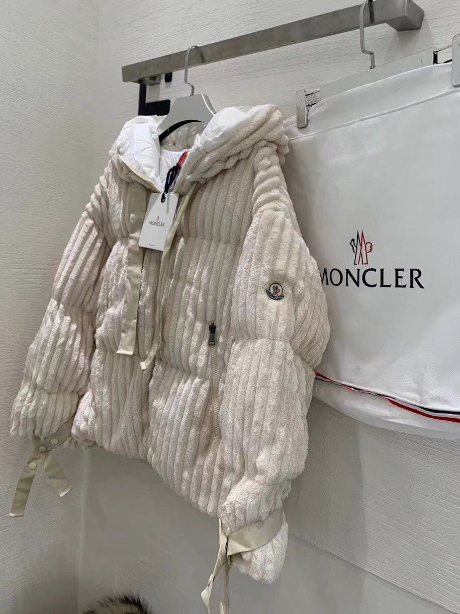 Cream long hooded puffer jacket with front zipper and drawstring trim