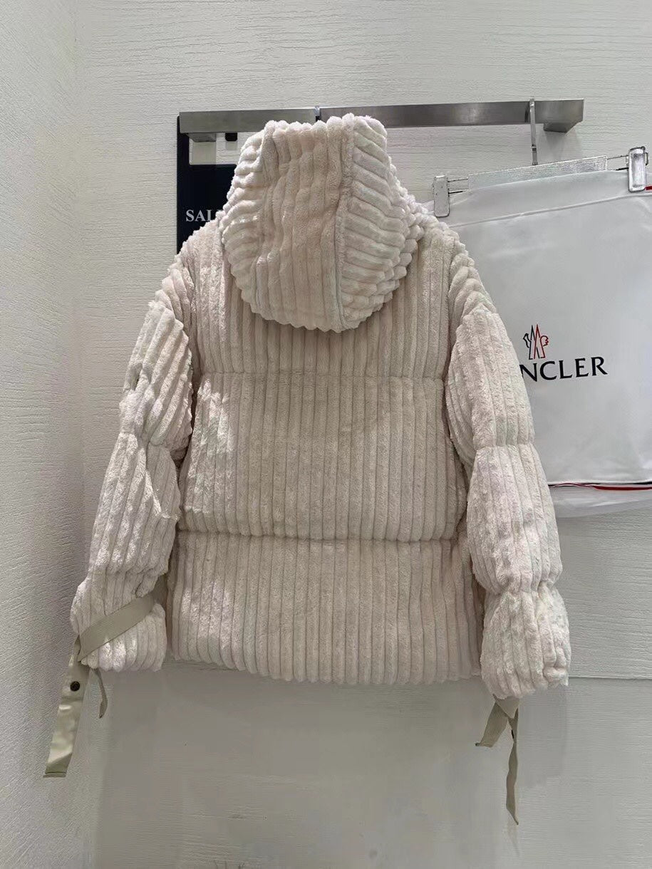 Cream long back view puffer jacket with attached hood and ribbon-tie details