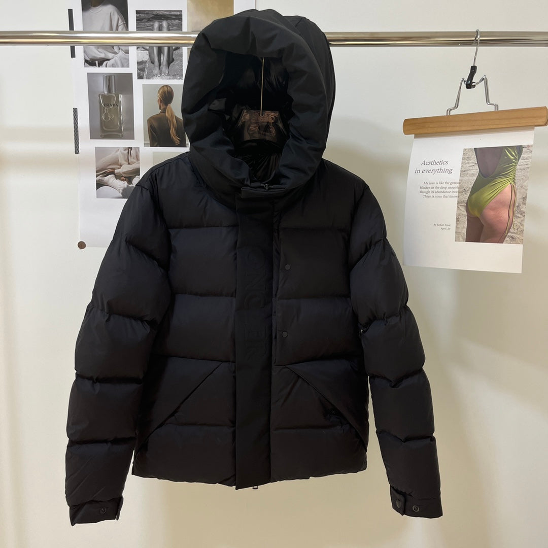 Black long puffer jacket with hood up and front zipper