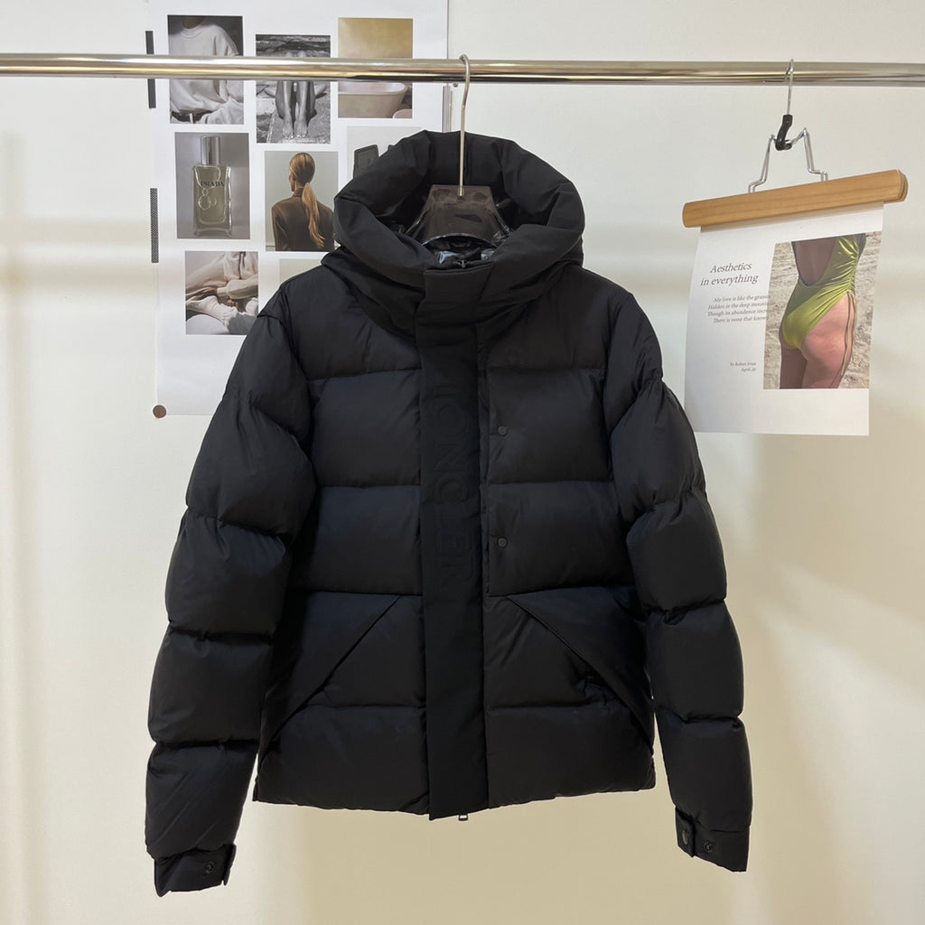 Black long puffer jacket with raised hood and front zipper