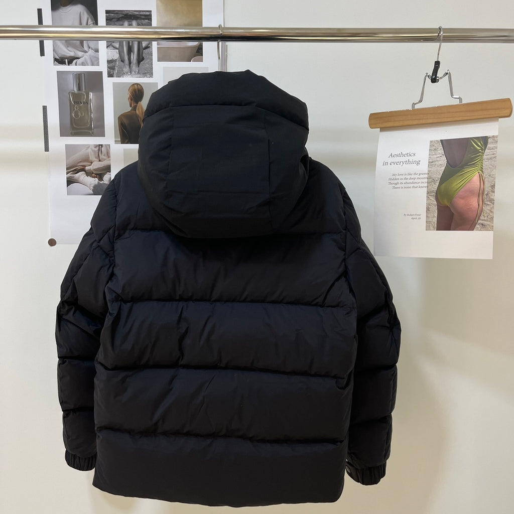 Black long puffer jacket, back view with hood and quilted rows