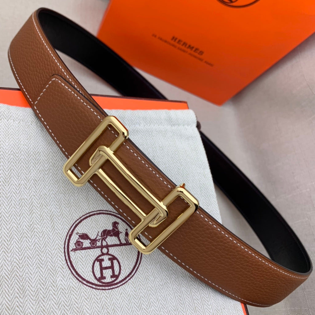 Brown leather belt with gold-tone double H buckle and stitched edges.