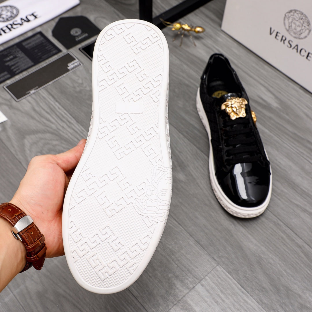 Versace black sneakers with textured white outsole and patent black upper
