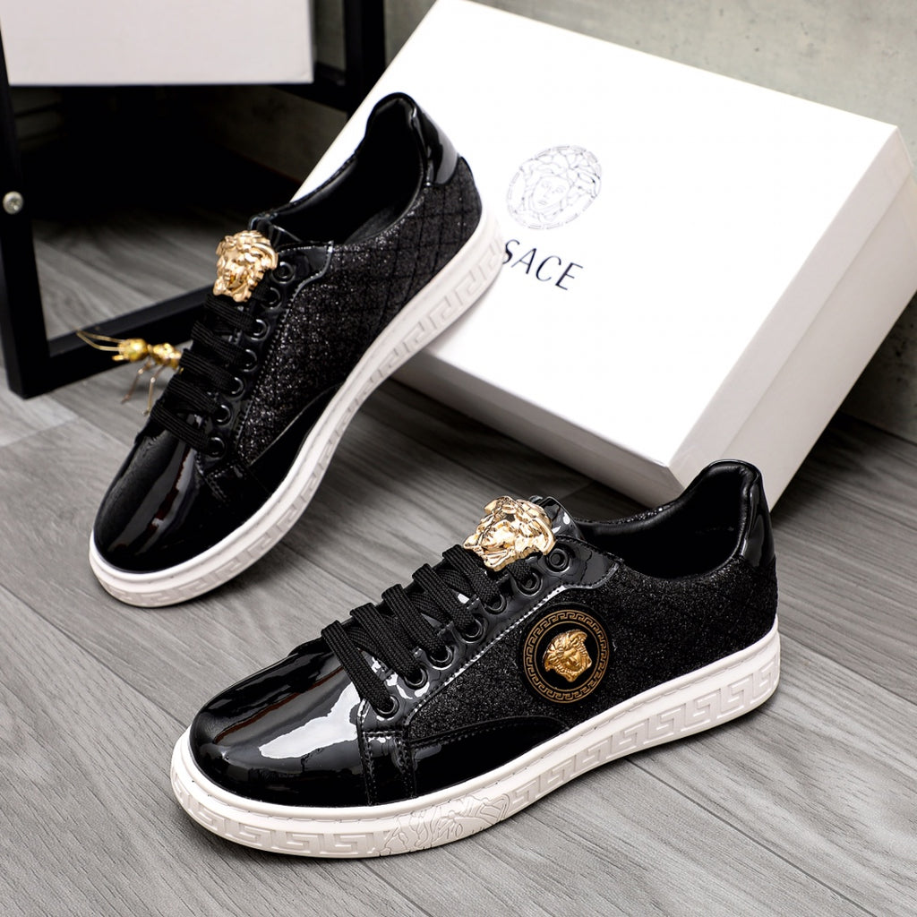 Versace black sneakers with gold lion emblem and black laced leather look