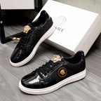 Versace black sneakers with gold lion emblem and black laced leather look