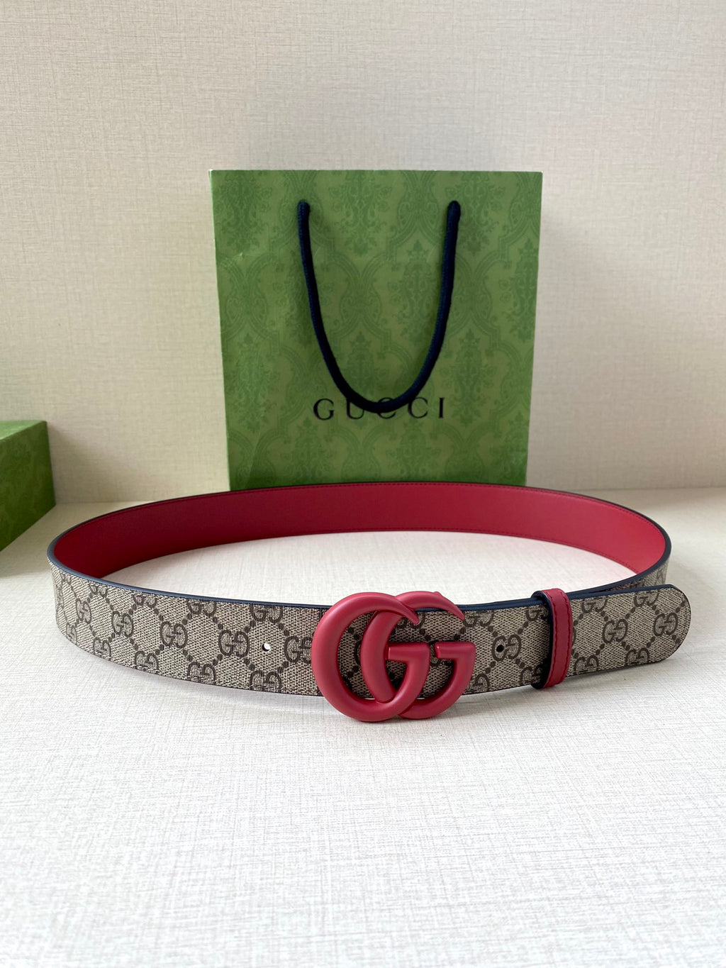 GG monogram waist belt with red leather and pink double-G buckle
