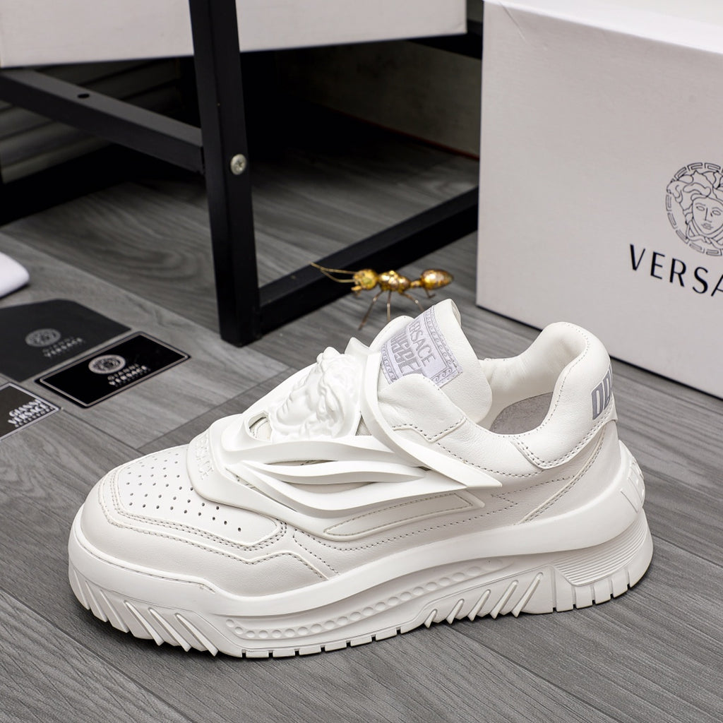White Versace lace-up sneakers, side logo tab and thick tread outsole.