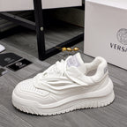 White Versace lace-up sneakers, side logo tab and thick tread outsole.