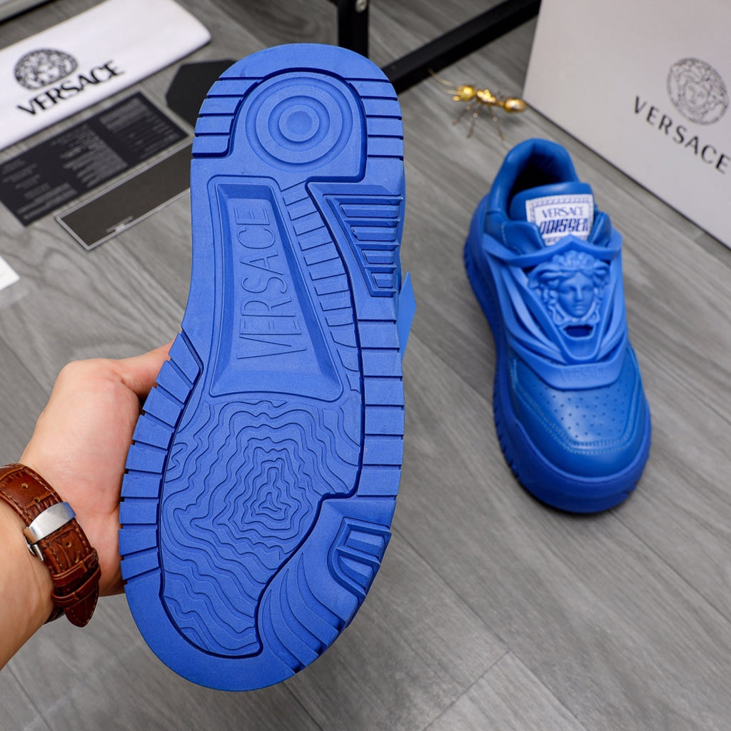 Blue Versace luxury sneaker sole with logo tread, outsole view