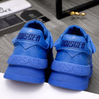 Blue Versace luxury sneakers with heel branding and rear tread