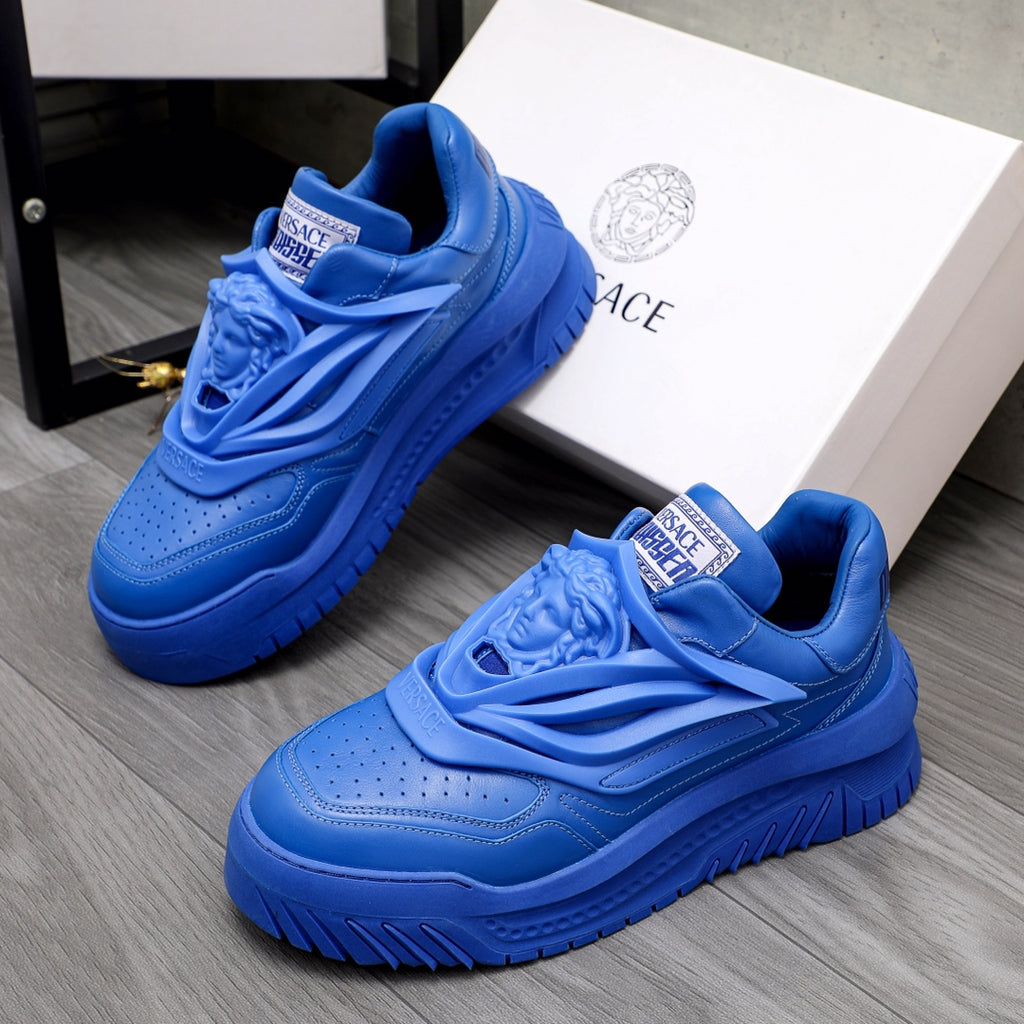 Blue Versace luxury sneakers with lace-up front and textured sole