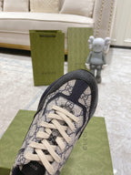 Gucci unisex sneaker toe view with GG monogram canvas and cream laces