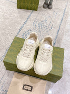 Gucci unisex sneakers, white leather, lace-up front view