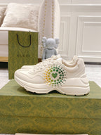 Gucci unisex sneakers, white leather, heart-dot graphic on side