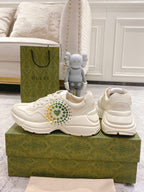 Gucci unisex sneakers, white leather, side and heel profile on box
