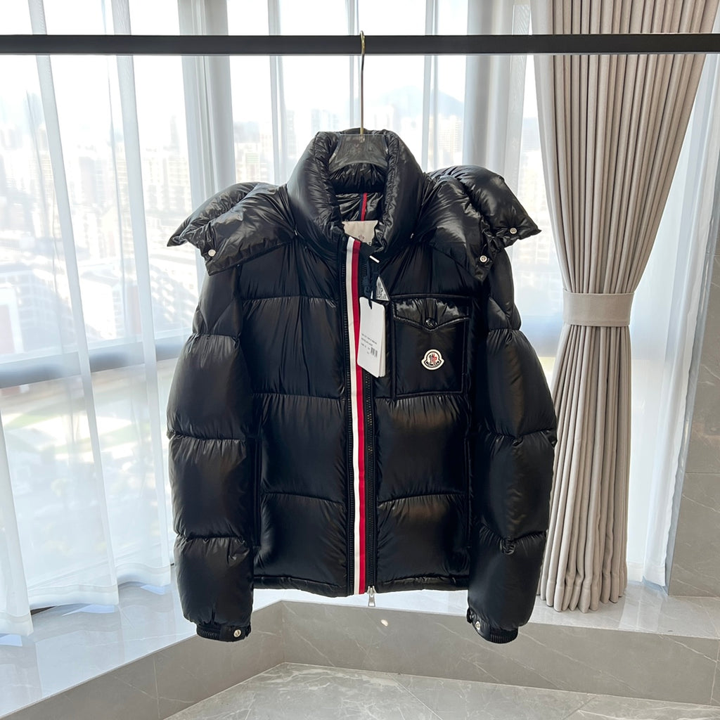 Long Moncler puffer jacket with hood, front zip and two chest pockets
