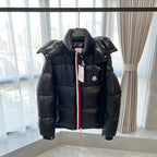 Long Moncler puffer jacket with hood, front zip and two chest pockets