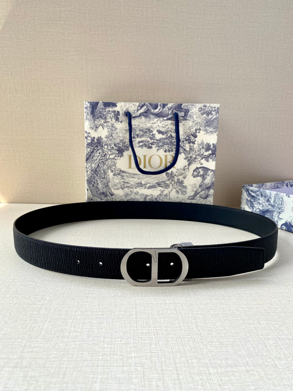 Dior belt flat with dark blue strap and black buckle with prong detail