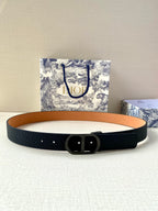 Dior belt with dark navy textured strap and black buckle center ring