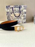 Dior belt with dark navy strap and gold buckle with open center