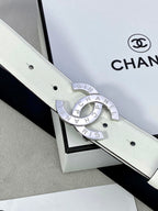 Chanel belt in pale white leather with silver-toned CC buckle and eyelet holes