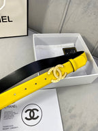 Yellow leather belt with black underside and gold-tone CC clasp