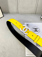 Yellow leather belt with gold-tone CC buckle and black underside on box