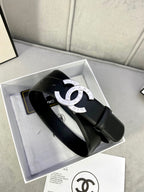 Black leather belt with silver CC buckle on a box insert