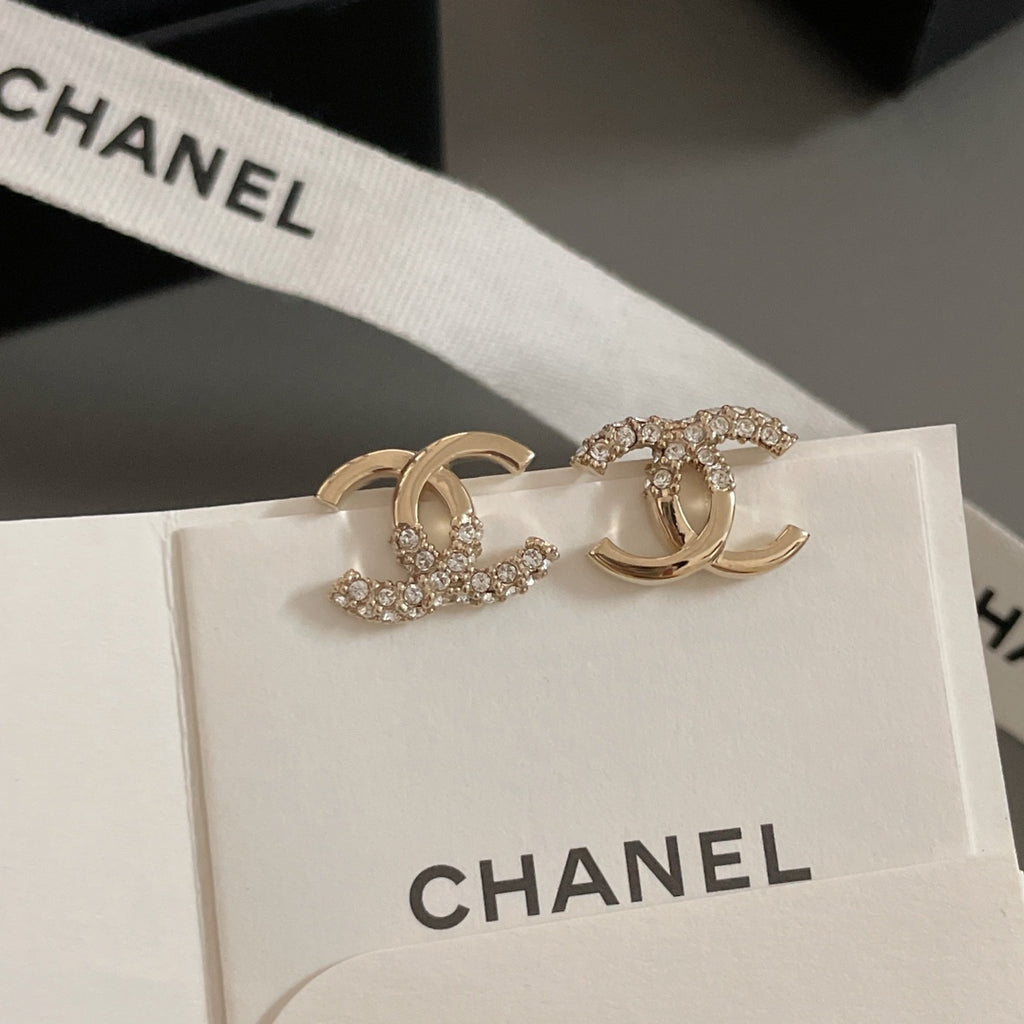 Gold-tone CC hoop and rhinestone earrings on card with CHANEL label