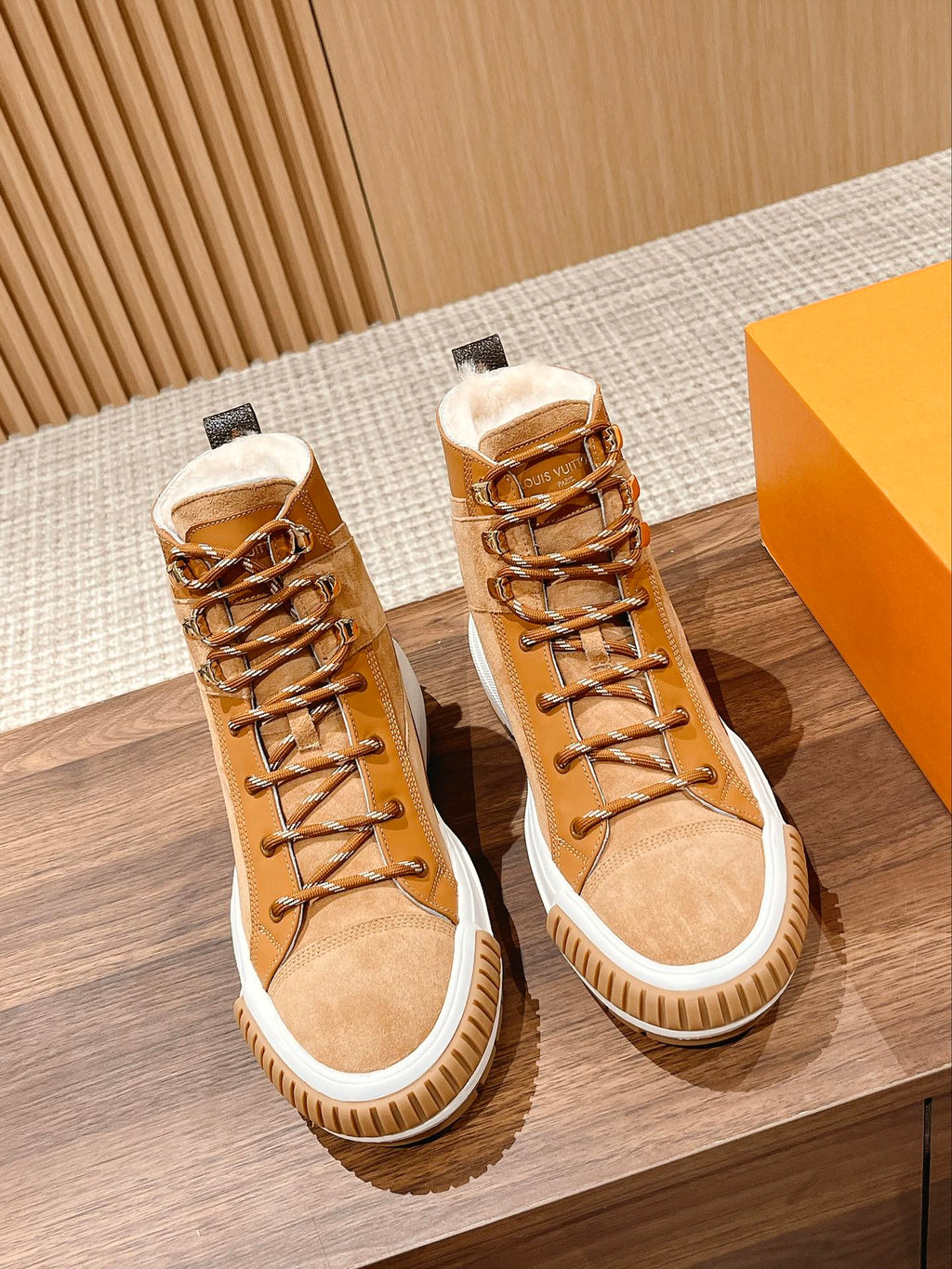 Louis Vuitton unisex high-top sneakers in tan suede with white rubber sole and laces