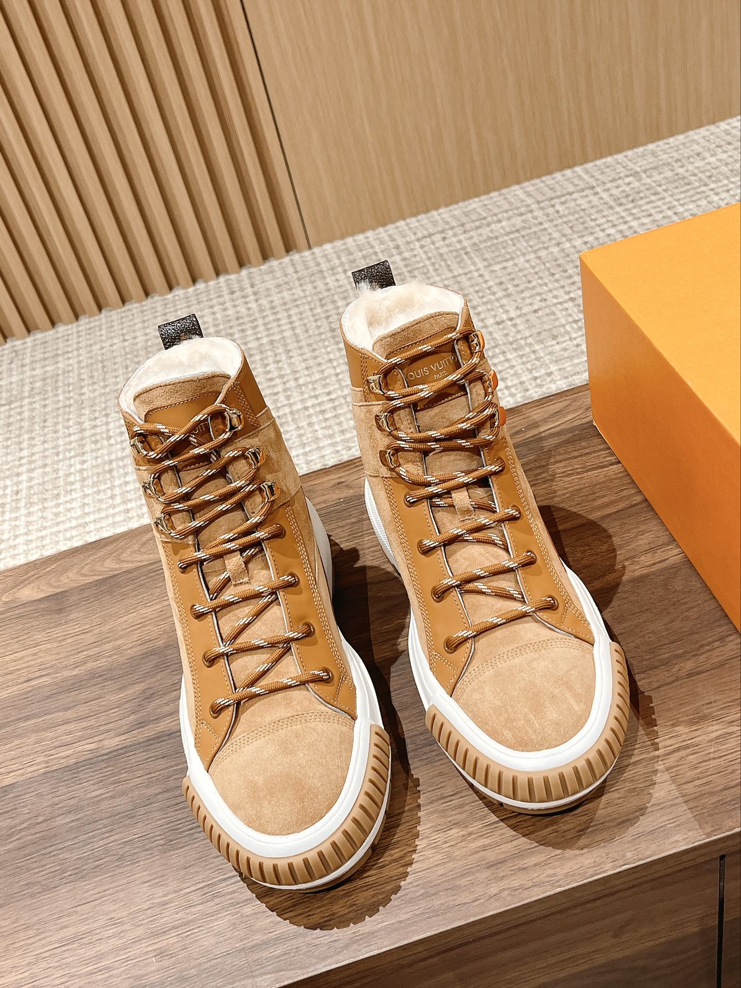 Louis Vuitton unisex high-top sneakers in tan suede with white rubber sole and laces