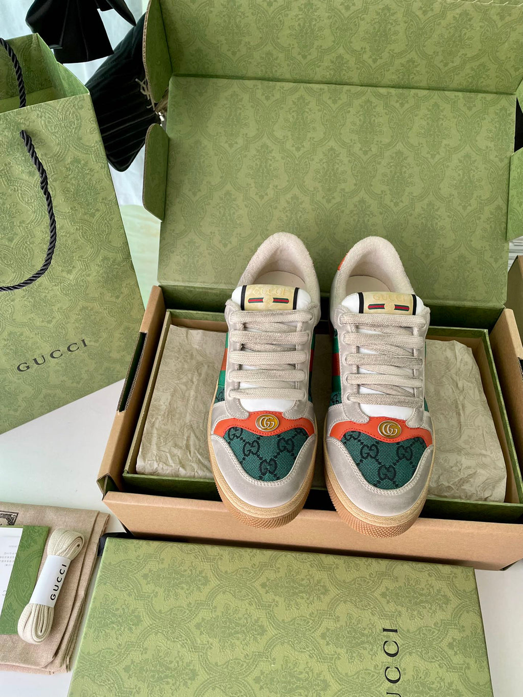 Gucci unisex sneakers in light beige with green and orange logo accents