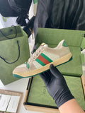 Gucci unisex sneaker, beige with green/red striped side and teal heel trim