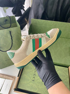 Gucci unisex sneaker, beige front with green/red/white stripe detail and laces