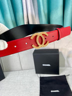 Red leather belt with black underside and gold-tone CC buckle
