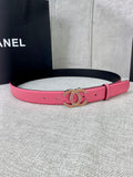 Pink leather belt with gold-tone CC buckle and gold studs along the strap