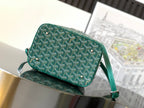 Goyard teal small bag with front zip, rounded top handle and leather side tabs
