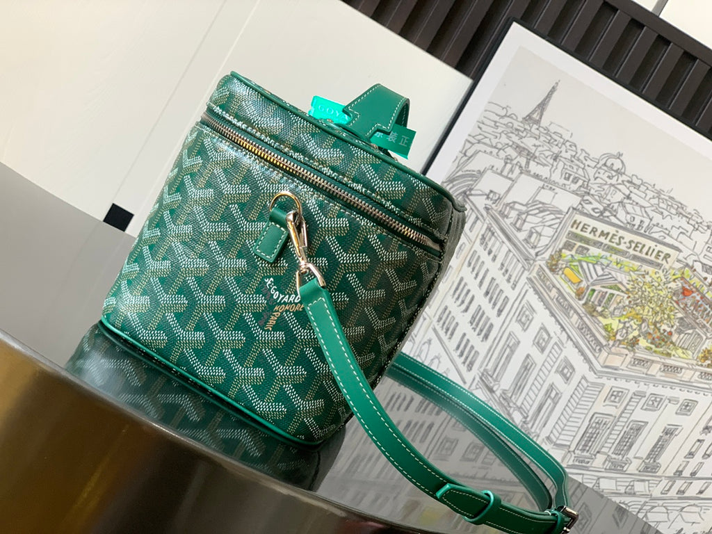 Green patterned small crossbody bag with front zipper pocket and adjustable shoulder strap