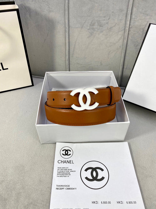 Chanel belt laid in box, tan leather strap with large gold-tone CC logo buckle