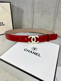 Red leather belt with gold-tone CC logo buckle and eyelet holes