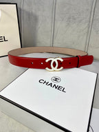 Red leather belt with gold-tone CC logo buckle and eyelet holes